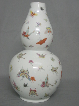 A 19th Century Oriental porcelain double gourd shaped vase decorated butterflies, the base with seal mark 14"