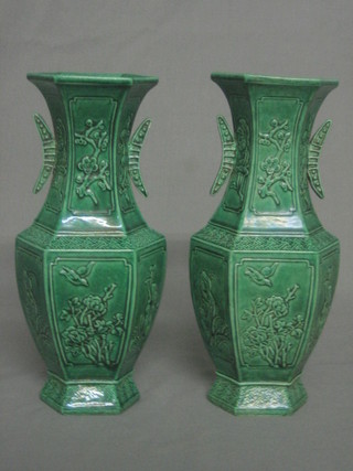 A handsome pair of 18th Century green glazed Oriental twin handled vases, the base with seal mark 8"