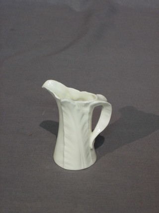 A Royal Worcester blanc de chine leaf shaped jug, the base with green mark 3"