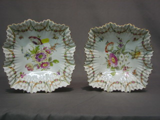 A pair of Dresden square shaped porcelain dishes with floral painted decoration and gilt banding - possibly decorated by Donath (f) 8"