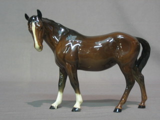A Beswick figure of a standing bay horse (hoof and ear f and r) 7"