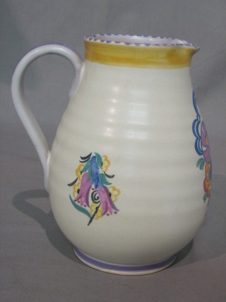 A Poole Pottery jug the base with impressed mark Poole England and marked EA/CL 8"