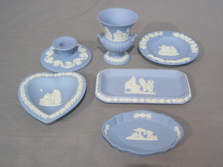 A Wedgwood blue Jasperware pin tray 6", do. ashtray 4", do. campanular vase, heart shaped pin tray and an ashtray 