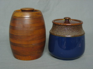 A circular Denby Lovatts pottery tobacco jar 5" and a turned wooden ditto