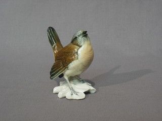 A Continental porcelain figure of a bird 3"
