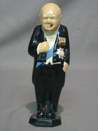 A plaster figure of a standing Sir Winston Churchill 7"