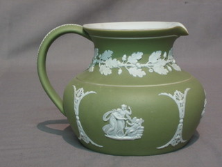 A 19th Century Wedgwood green Jasperware jug with classical oak leaf decoration 5"