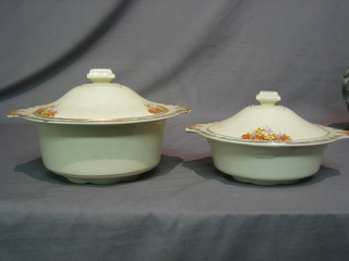 A Thomas Hughes 37 piece pottery dinner service comprising 2 soup tureens and covers 10", 11 dinner plates 10", 9 soup bowls 10", 7 pudding bowls 9", 7 side plates 8" and a 7" plate