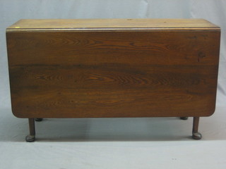 An 18th/19th Century rectangular oak drop flap gateleg dining table, raised on club supports 49"