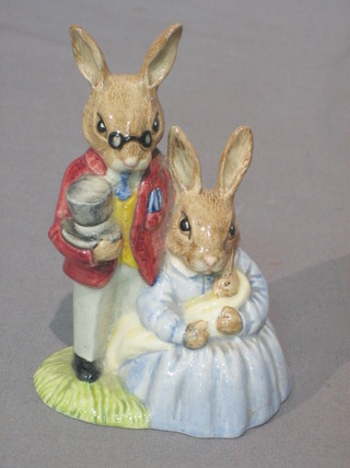 A Royal Doulton Bunnykins figure - Father and Mother and Victoria Bunnykins