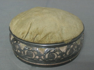 A pierced silver plated bottle coaster converted for use as a trinket box 4 1/2"