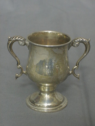 A silver twin handled trophy cup 3 1/2"