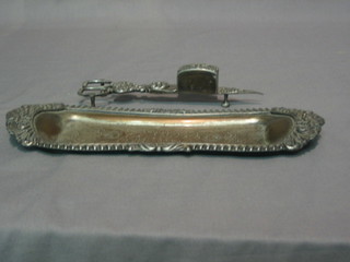 A pair of 19th Century silver candle snuffers complete with tray