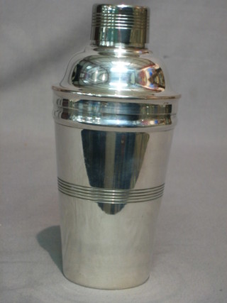 An Art Deco silver plated cocktail shaker