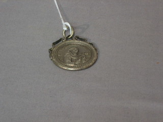 A white metal religious medal