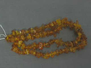 A string of amber coloured beads