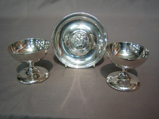 An Art Deco circular silver plated ashtray decorated a St Christopher medal, by Mappin & Webb 5" and 2 Mappin & Webb Sundae dishes