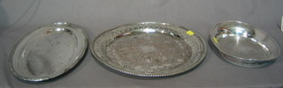 A circular pierced and engraved silver plated salver 11", an oval silver plated platter 13" and a boat shaped dish 10"