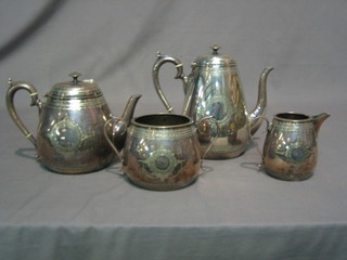 A Victorian circular 4 piece engraved silver plated tea/coffee service with tea pot, coffee pot, twin handled sugar bowl and cream jug
