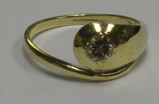 An 18ct gold serpent ring set a solitaire diamond
