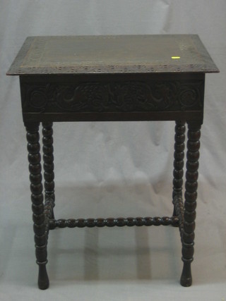 A Victorian carved oak occasional table, raised on bobbin turned supports with H framed stretcher 24"