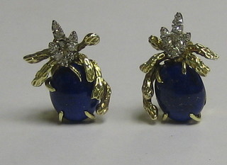 A pair of lady's 18ct gold ear clips set lapis lazuli and 9 diamonds