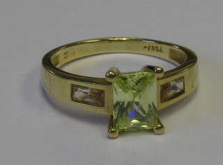 An 18ct gold dress ring set a rectangular "citrene"