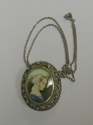 A portrait miniature of a Continental lady contained in a silver and turquoise mounted brooch/pendant hung a silver chain
