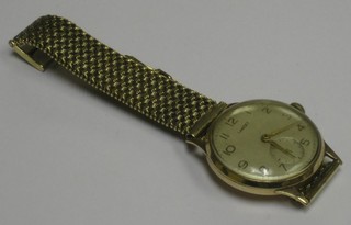 A gentleman's Lancet wristwatch  contained in a 9ct gold case and complete with 9ct gold integral bracelet