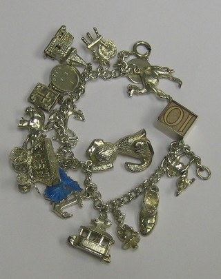 A silver charm bracelet hung numerous charms