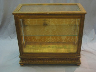 A 19th Century gilt painted table top display cabinet 26"