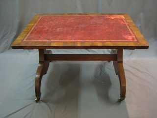 A rectangular mahogany coffee table with inset tooled leather writing surface formed from the base of a cheval mirror, 35"