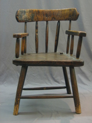An 18th/19th Century elm stick and bar back carver chair with solid elm seat