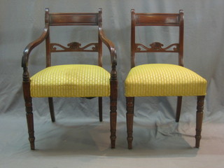 A set of 8 Georgian  mahogany bar back dining chairs with pierced mid rails and upholstered seats, raised on turned supports