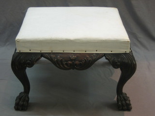 A 19th Century Chippendale style carved mahogany stool, raised on cabriole supports 24"