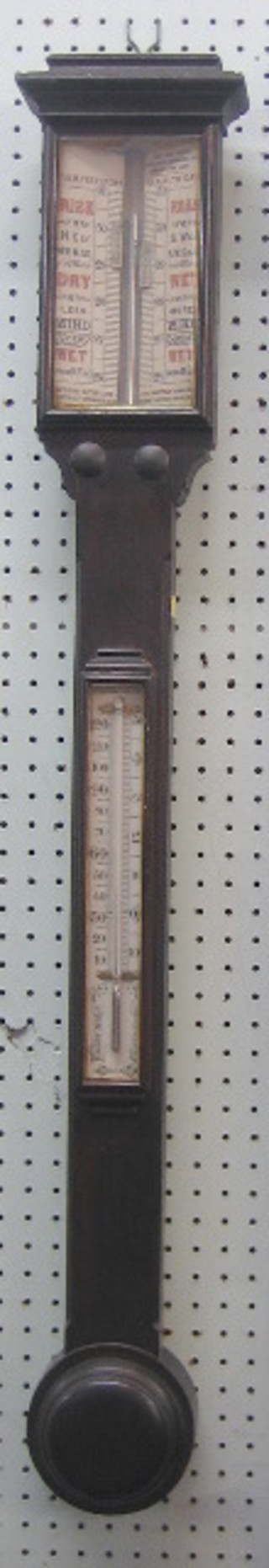 A Victorian mercury stick barometer and thermometer contained in a mahogany case