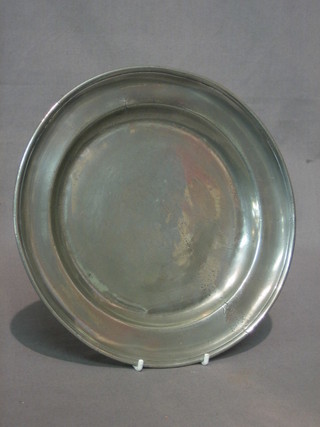 An 18th/19th Century pewter plate, the reverse with touch mark 9"