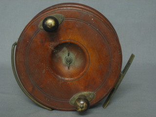 A large "Millwood" wooden starback centre pin fishing reel 6"