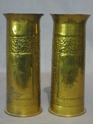 A pair of WWI Continental brass Trench Art shell cases with embossed decoration