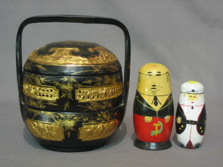 An Eastern lacquered circular 3 tier "wedding" box and 2 Russian nesting dolls