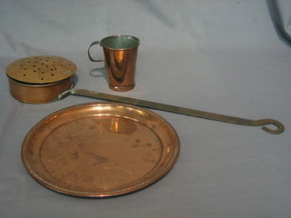 A copper chestnut roaster, a small copper salver and a copper mug