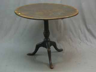 A 19th Century circular mahogany snap top tea table 32"