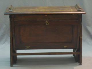 An Edwardian mahogany and canvas folding campaign bed 29"