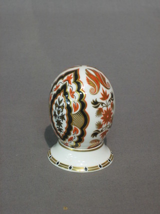 A Royal Crown Derby porcelain egg 2 1/2
