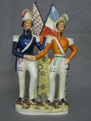 A 19th Century Staffordshire figure of 2 standing soldiers 11"