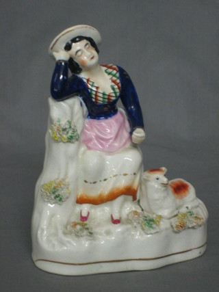 A 19th Century Staffordshire figure of a seated girl with lamb 6"