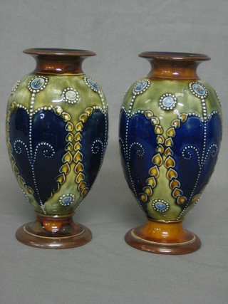 A pair of Royal Doulton green and blue salt glazed squat shaped vases, the base marked Royal Doulton 5HG 8"