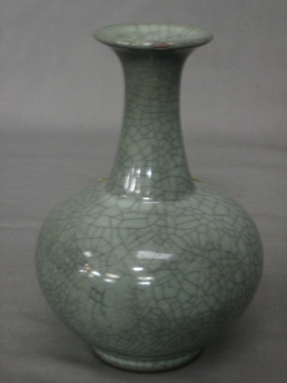 An 18th/19th Century Oriental grey club shaped crackle glazed vase 6"