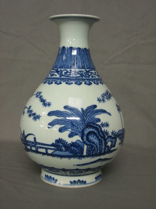 An Oriental blue and white club shaped vase decorated roach, with seal mark to the base (rim of neck f and r) 11"