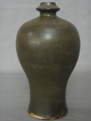 A 17th/18th Century brown glazed Oriental vase 9"